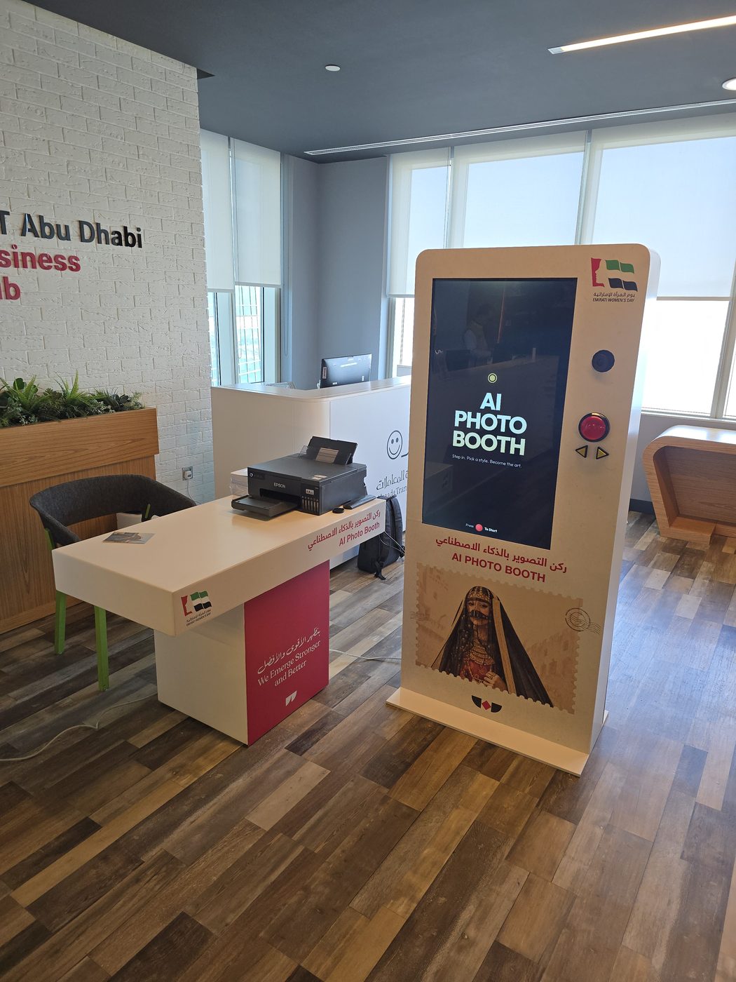 The AI Photo Booth kiosk and its photo printer installed at an Emirati Women’s Day event in Abu Dhabi.
